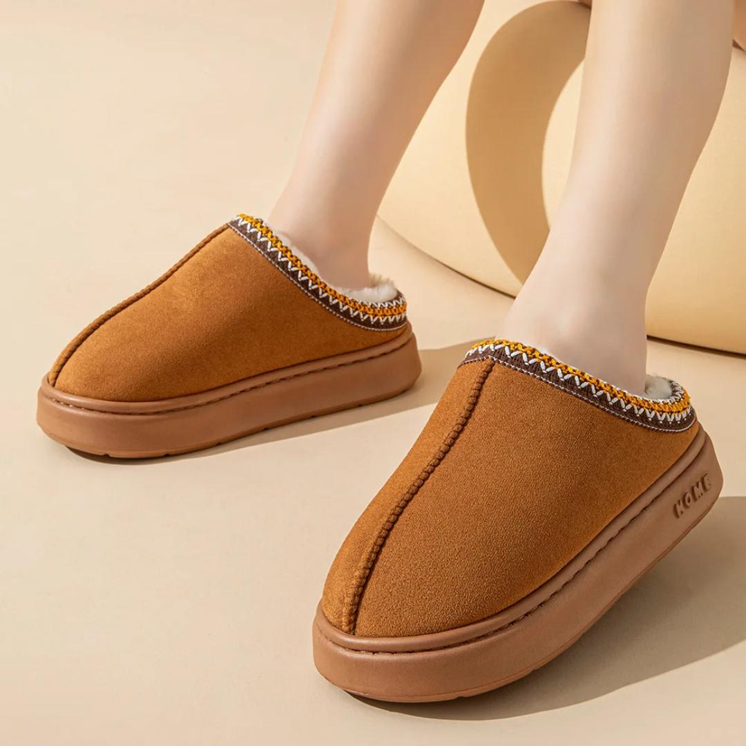 Warm slippers with sturdy sole