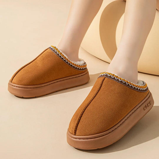 Warm slippers with sturdy sole