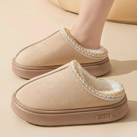 Warm slippers with sturdy sole